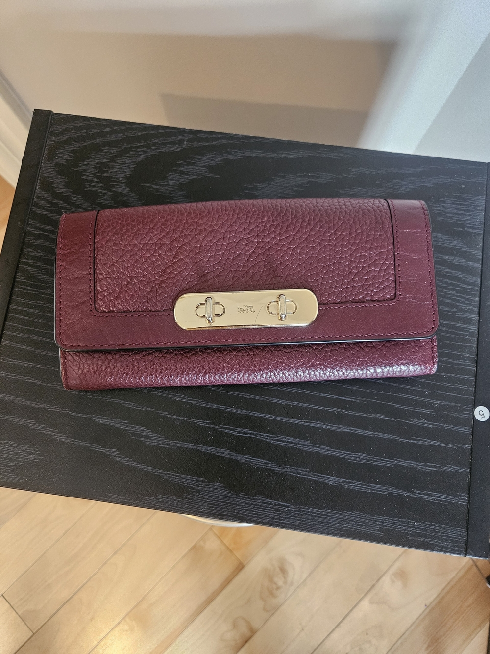 Coach Pebbled Leather Turnlock Wallet in Plum